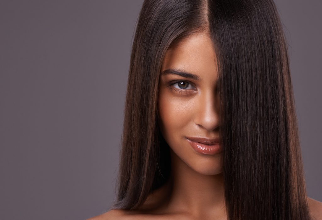 Portrait of a beautiful young woman posing in the studio